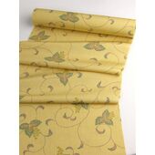 A tsumugi kimono woven in Tango, featuring an arabesque pattern in yellow orange